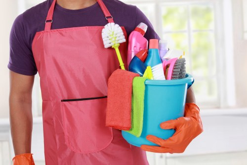 Carpet cleaning staff preparing equipment safely