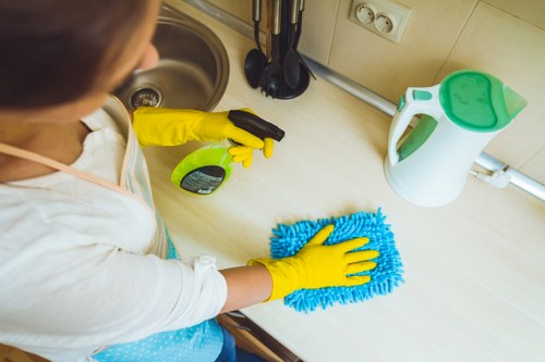 Airbnb cleaner preparing a guest-ready apartment in Maidavale